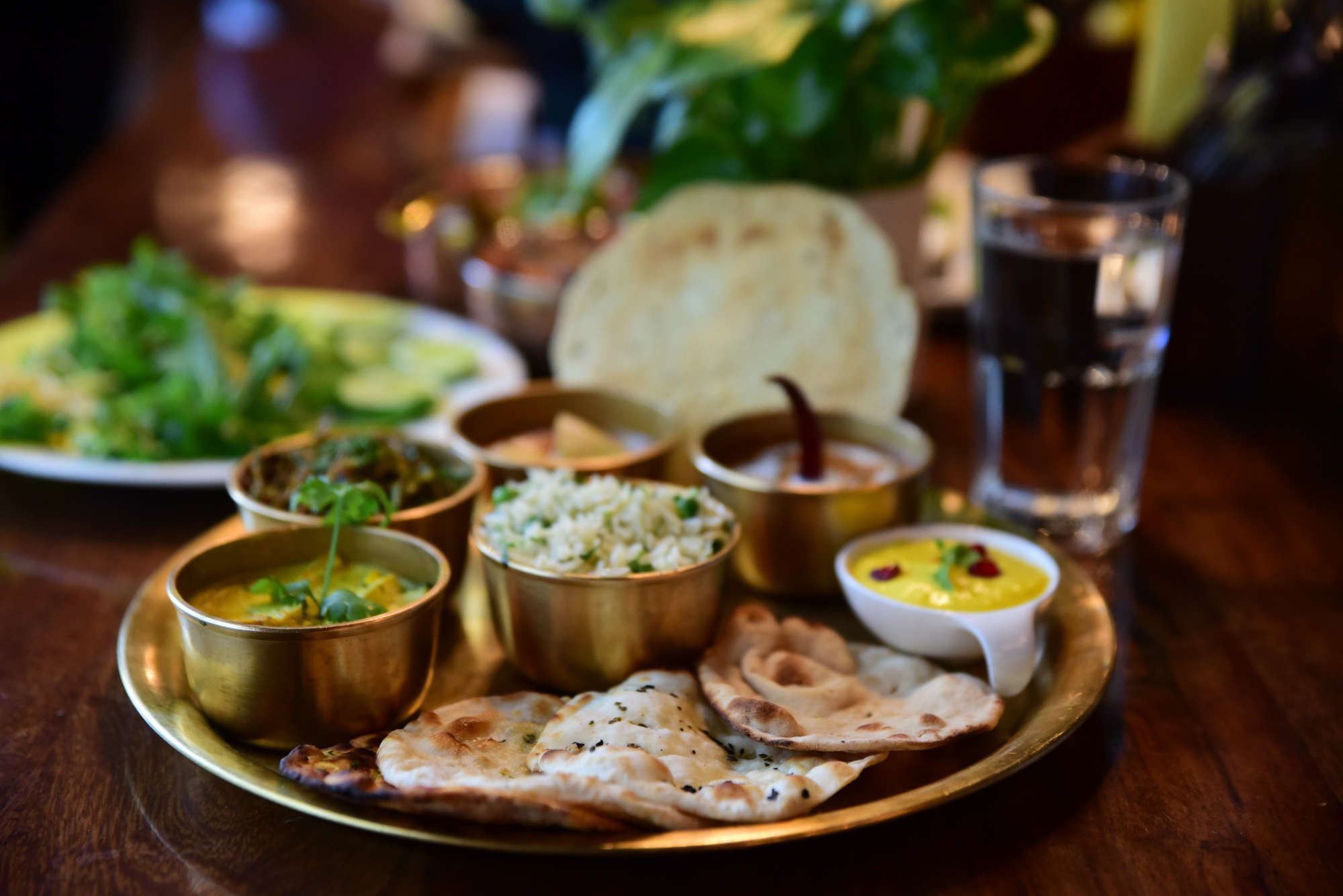 A spread of Indian food with curries, rice and chutneys — off-dry Riesling is the outstanding wine for spicy Asian cuisine, where its residual sugar tempers the heat