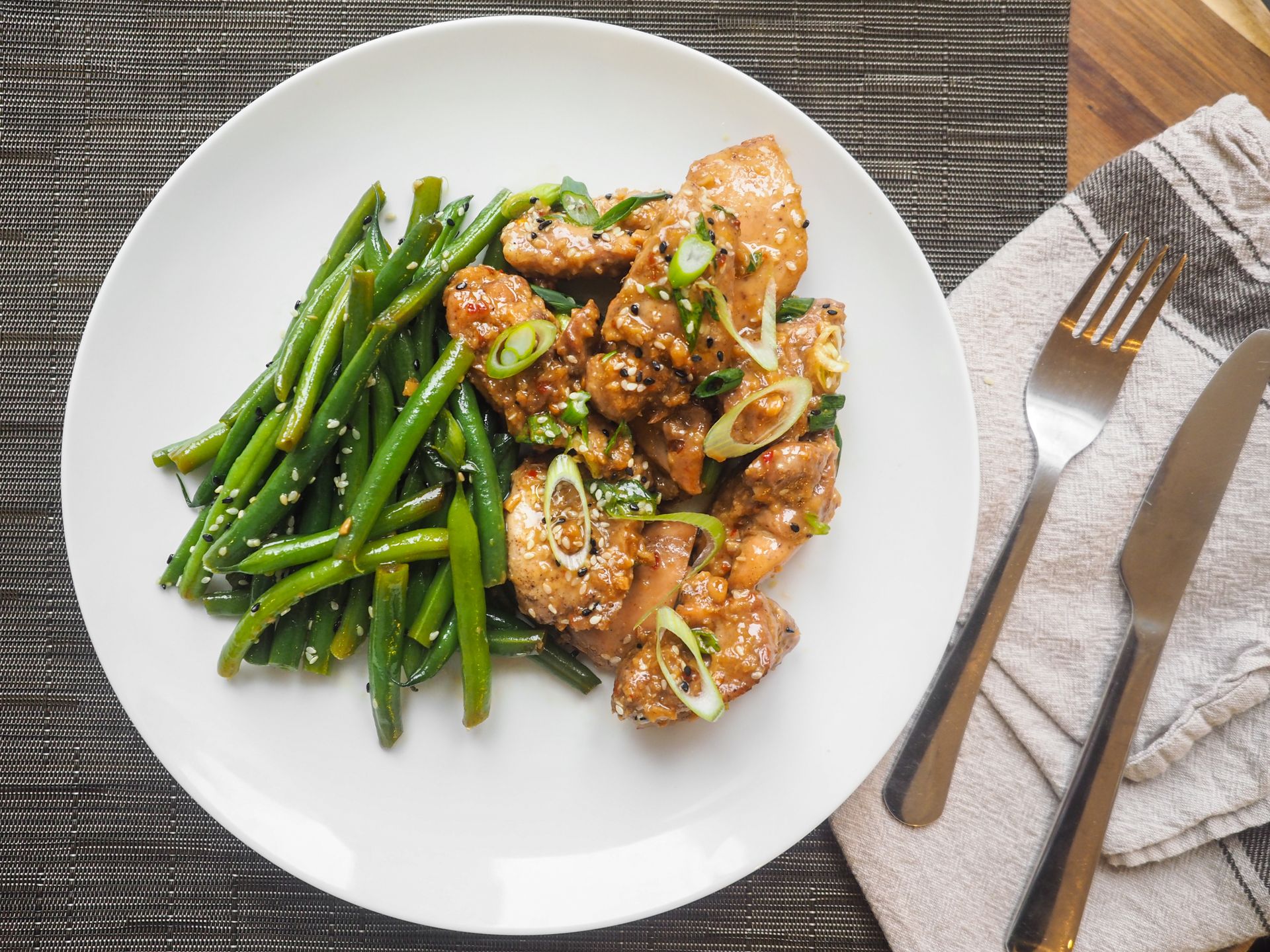 Fresh salmon fillet with lemon and herbs — the cooking method and sauce determine which wine works best with salmon