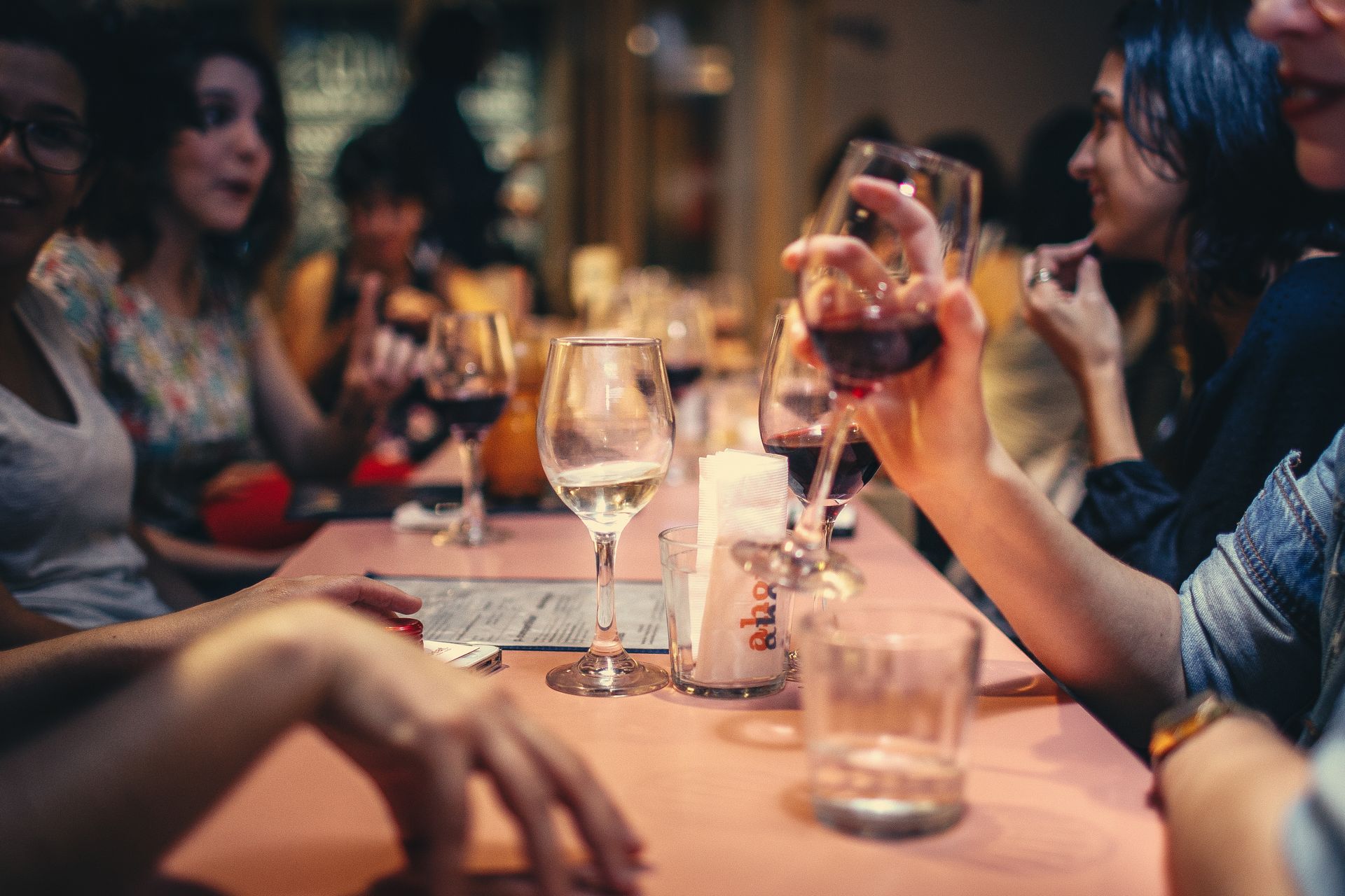 A glass of deep red Tempranillo wine in a vineyard setting — Spain's most important red grape produces wines ranging from bright and fruity to complex and age-worthy